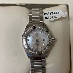 Tag Heuer Silver Watch with Sparkling Bezel and Stainless Steel Band